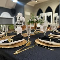 Black and gold table setting