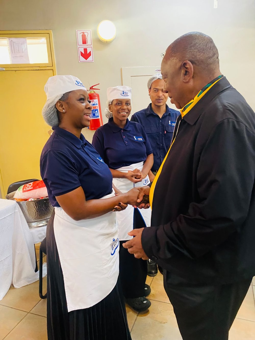 Ntokazi Catering staff shaking hands with the President of South Africa
